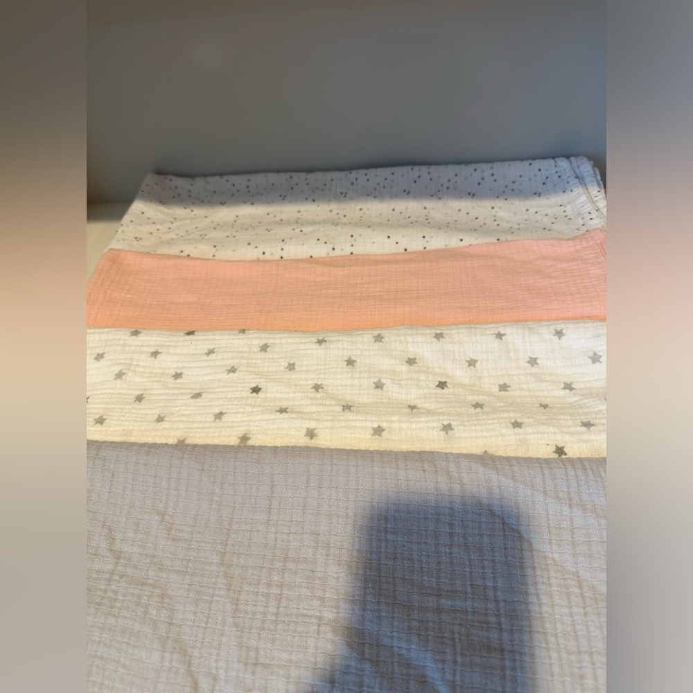 Bundle of 4 Muslin Swaddle Blankets - Gray, Pink, & 2 White with Gray Stars